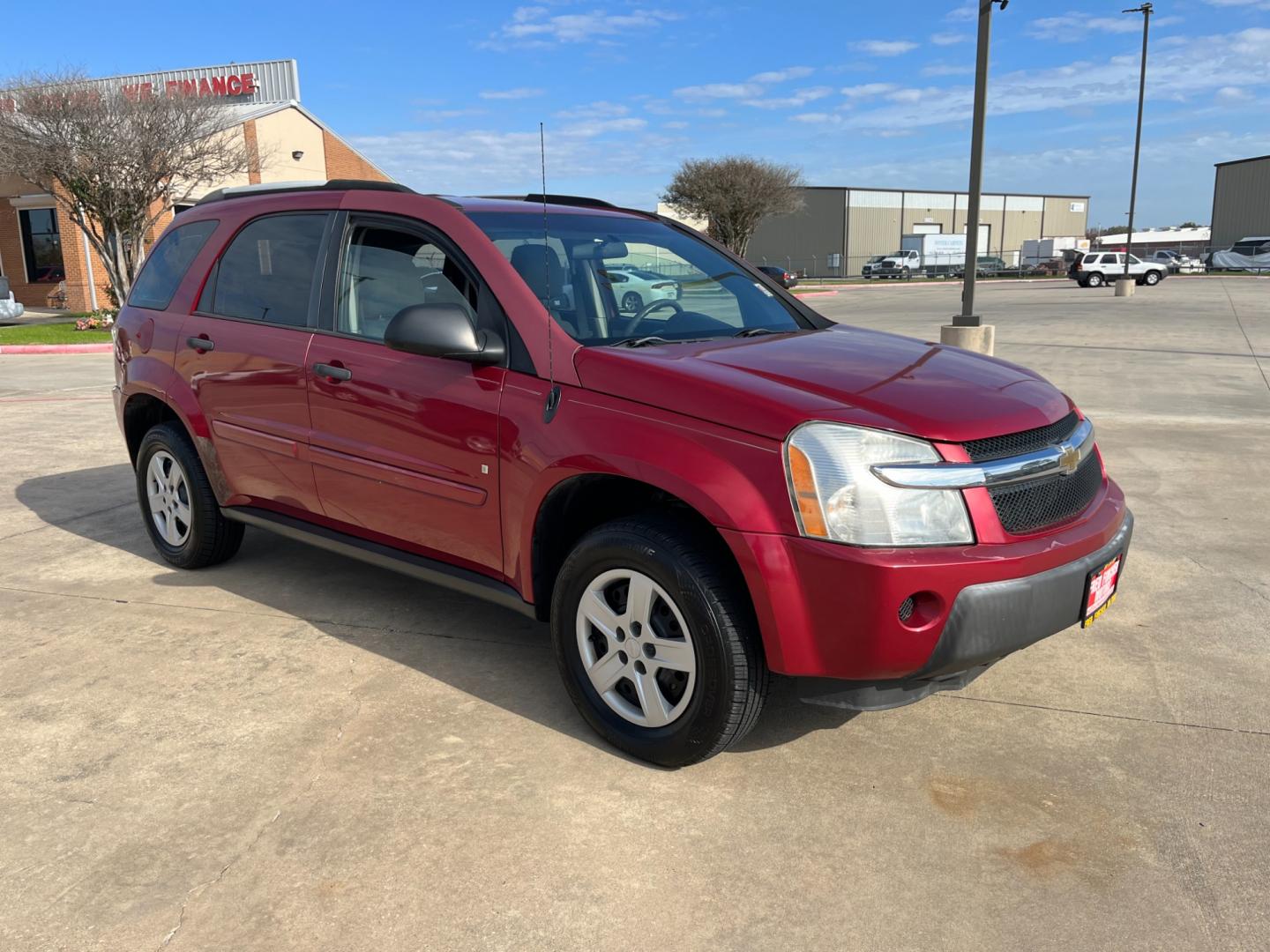 2006 red /TAN Chevrolet Equinox LS 2WD (2CNDL13F366) with an 3.4L V6 OHV 12V engine, 5-Speed Automatic transmission, located at 14700 Tomball Parkway 249, Houston, TX, 77086, (281) 444-2200, 29.928619, -95.504074 - Photo#0